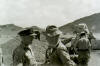 Cpl. Bert Leslie speaking to a visiting officer at Al-Milah