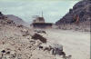 Dozer clearing rubble on the Dhala Road, Al-Milah