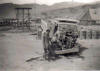 Eric Whitla, former member of 24 Field Sqn RE  standing next to the Commer at Al-Milah, was the driver of the vehicle when hit a mine. The passenger of the vehicle was injured but is now fit and well.
