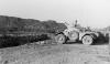 F/Ground: Ferret on Stag at Al-Milah Camp perimeter. B/Ground: Rock out crop where Rebels fired on Al-Milah Camp 12 April 1965. 