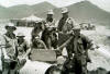 Gibby Earl, Jim Davidson and others building a culvert at Al--Milah