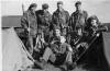 Otterburn Camp circa late 50s. L to R standing ?, Brian young, Brian McKean, Adam Forbes, seated,  W. Grieve, John Donaldson, Joe McIntosh and Jim Lowder with the bottle.